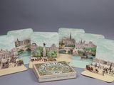 quatre sous-verres avec l'image d'une ville et d'un pont