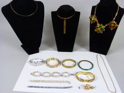 a lot of jewelry on display on the table