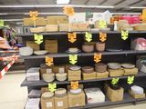 many shelves with different types of dishes on them