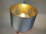 a lamp that is on top of a table