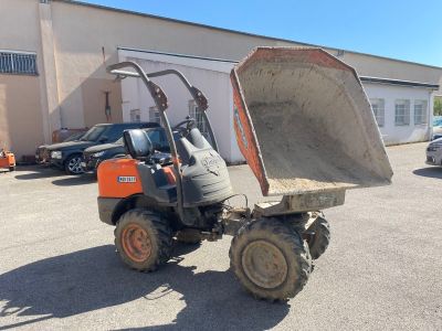 an image of a tractor with a bucket in the back