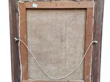 an old picture frame with a rope hanging from it ' s side