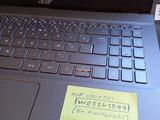 a laptop with a sticky note attached to it