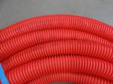 a close up of a red hose with a blue handle