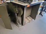an image of a desk with a computer on top of it