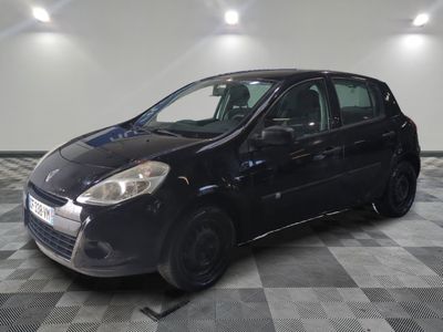 a picture of a black car parked in a garage