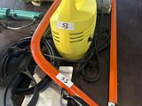 a picture of a yellow and black vacuum on a table