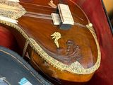 a guitar in a case that is sitting on a table