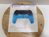 a box with a game controller on it on a table