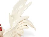 a figurine of a white rooster with a red beak