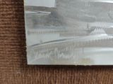 a picture of a painting on the wall of a chair