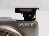 a close up of a camera with a flash light on it