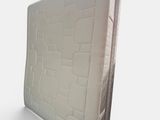 an image of a mattress that is on a white surface