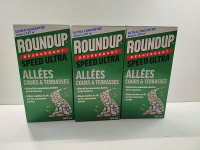 three boxes of roundup insect repellent on a table