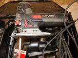 a picture of a corded sander sitting on top of a table