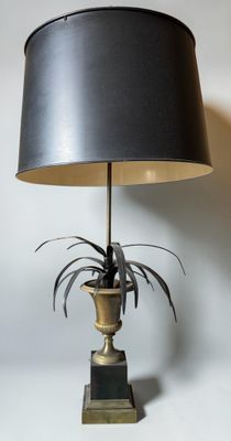 an image of a lamp with a black shade on a table