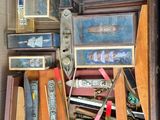 a pile of assorted items sitting in a box