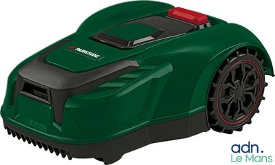 a green robotic lawn mower with a red handle