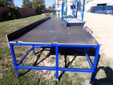 a table that is sitting on the ground in the yard