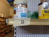 a shelf that has various items on it in a store