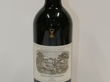 a bottle of wine that is sitting on a table