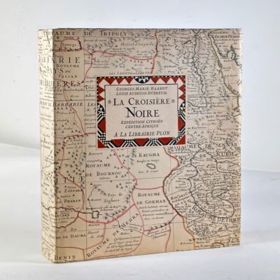 an old book with a map of europe on the cover
