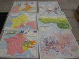 four maps of europe and the middle east on a tiled floor