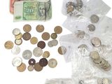 a bag of coins and a bunch of money on the table