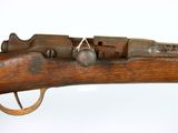 an old rifle with a wooden handle on a white background