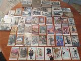a lot of old postcards on the table