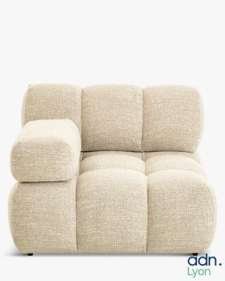 an image of a beige couch with pillows on it