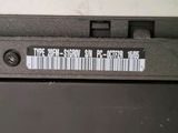 a close up of a laptop with a barcode on it