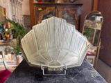 a white bowl that is on top of a table