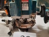 a machine that is sitting on a table with a number 32 on it