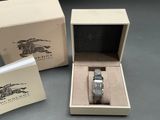 an image of a watch in a box and a box with a watch inside of it