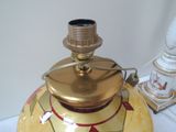 a lamp that is sitting on a table next to a lamp