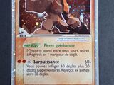 une photo d'une carte Pokémon sur laquelle figure l'image d'un chien