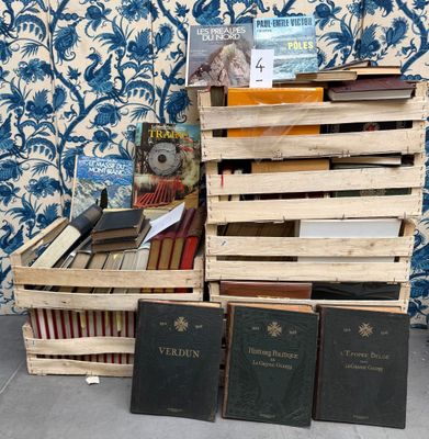 a stack of books sitting on top of a wooden crate