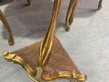a table that has a deer on it in the middle of the room