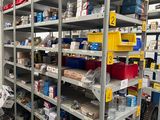 a lot of shelves that have various items on them