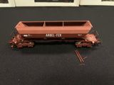 a toy train car with a ladder on the side