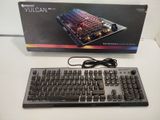 a box with a keyboard and a mouse on the table
