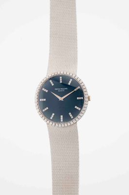 an image of a close up of a watch on a white background