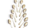 several spoons are arranged in the shape of a christmas tree