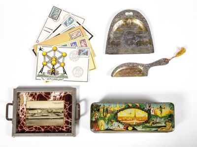 various items that are sitting on a white surface