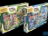 two boxes of pokemon trading cards are shown on a black background