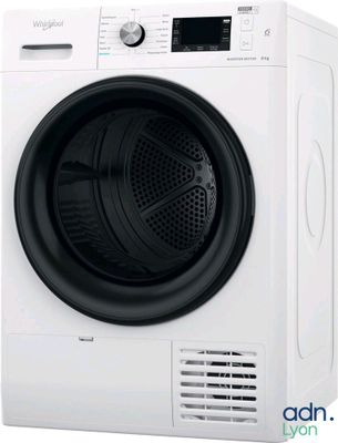 a close up of a washing machine with the door open