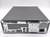 the back view of a computer with a hard drive attached to it