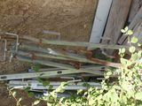 many pieces of wood that are laying on the ground