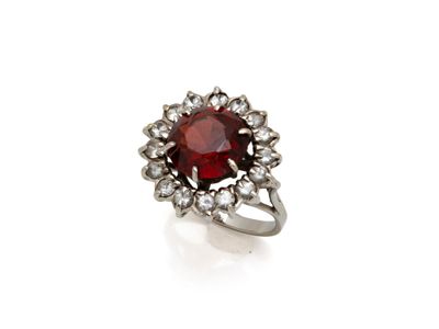 a ruby and diamond cluster ring